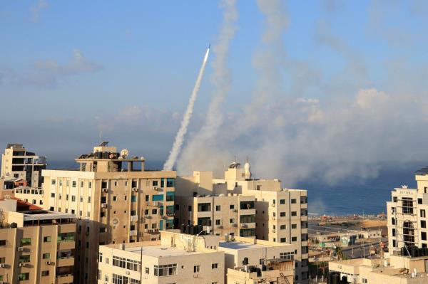 Dozens of rockets were fired from the blockaded Gaza Strip towards Israel on Oct. 7, 2023, an AFP journalist in the Palestinian territory said, as sirens warning of incoming fire blared in Israel.